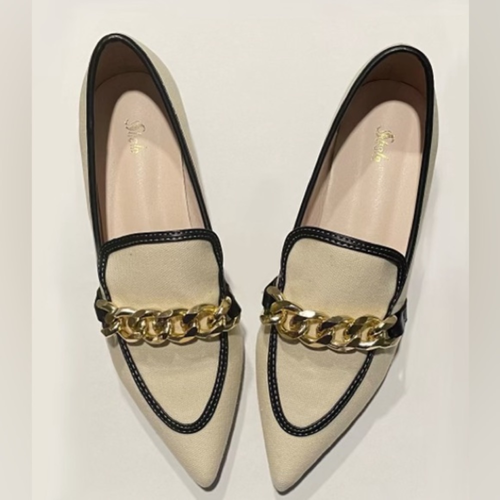 The brand is SHEIN, the color is creamy white, with black details. The size is 8